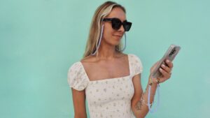 sunglasses cord on model with phone cord