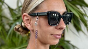 silver beaded purple sunglasses cord on model